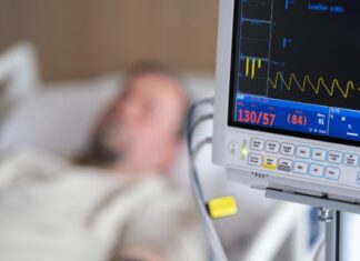 Man in Emergency Room Bed