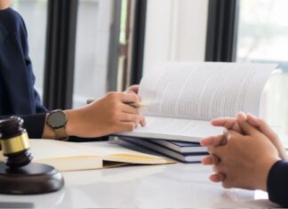 How A Personal Injury Lawyer Can Help Fight For Your Rights Woman Talking to Personal Injury Lawyer