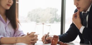 How a Lawyer Can Help With a Workplace Sexual Harassment Claim Woman Discussing Workplace Harassment with Attorney