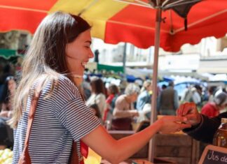 Why Visiting A Fresh Farm Market Is Worth Every Trip Woman Shopping at Farmers Market