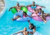 5 Must-Visit Water Parks Across The United States Family Enjoying Lazy River at Water Park