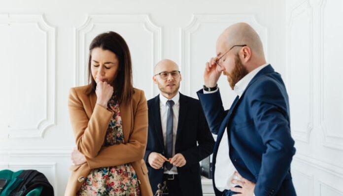 Couple Talking to Lawyer
