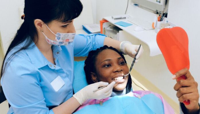 Overcome Dental Anxiety Woman Enjoying Visit With Dentist After Overcoming Dental Anxiety