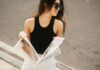 Woman Reading Magazine While Walking