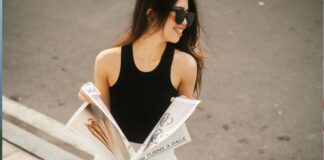 Woman Reading Magazine While Walking