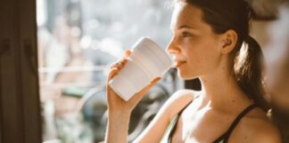 Making Wellness Fit into a Changed Daily Schedule gym woman drinking