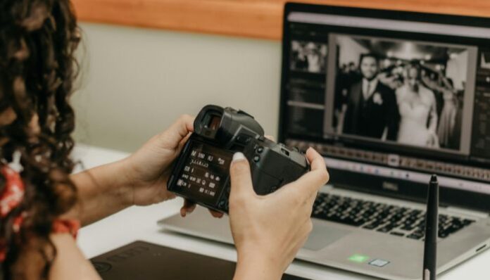 Woman Making Photo Adjustments on Camera