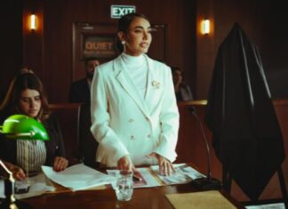 Woman Standing Up in Court Room
