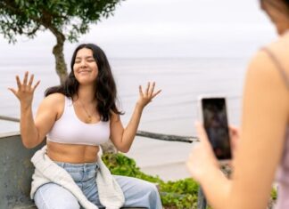 Millennial Women Are Creating Brands, Not Just Posts Two Young Women Recording a TikTok Video for Social Media