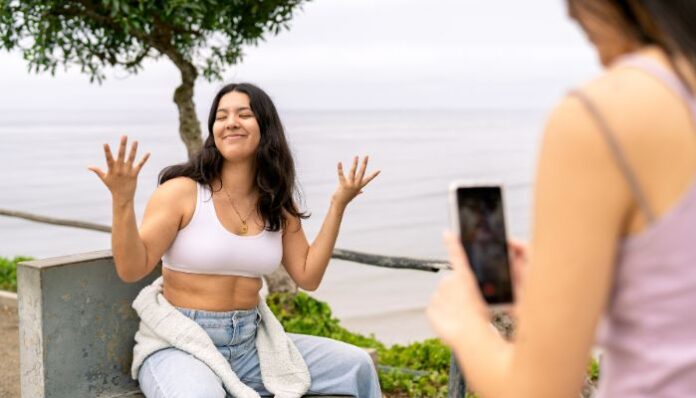 Millennial Women Social Media Two Young Women Recording a TikTok Video for Social Media