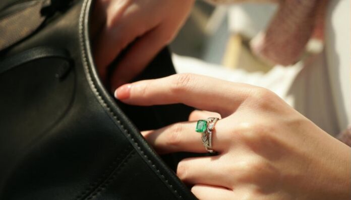 Woman Wearing Emerald Ring