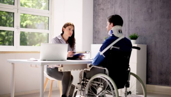 Car Crash Victim Talking to Car Accident Lawyer