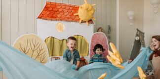 Family Enjoying Child Playroom