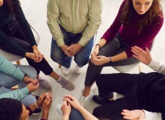 When Women Redefine Wellness, Addiction Recovery Looks Different Group Therapy Talking About Wellness and Addiction Recovery