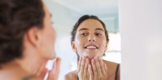 Woman Looking at Skin After Collagen