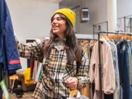 Woman Shopping in Retail Clothing Store