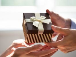 Man Giving Gift to Woman for Special Occasion Picked From Her Gift Registry