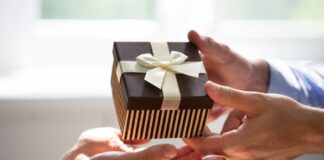 Man Giving Gift to Woman for Special Occasion Picked From Her Gift Registry