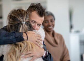 Tips for Overcoming Addiction & Finding Freedom Man and Woman Embracing After Addiction Treatment