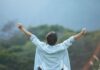 How Can I Grow Without Losing The Softest Parts Of Myself? Person Celebrating Growth and Accomplishment Outdoors