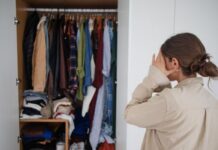 How to DIY The Perfect Wardrobe Closet Woman looking at wardrobe