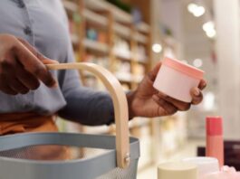 What I Wish I Knew Before Buying Expensive Skin Care Woman buying skincare products from beauty store