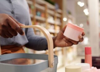 Woman buying skincare products from beauty store